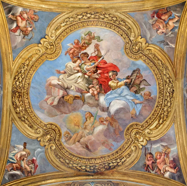 ROME, ITALY - MARCH 25, 2015: The fresco of virtues on the little cupola of side nave in church Basilica dei Santi Ambrogio e Carlo al Corso by Giacinto Brandi (1621 - 1691). — Stock Photo, Image