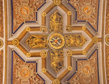 ROME, ITALY - MARCH 27, 2015: The fresco of symbols of four Evangelists in the corss on the ceiling in church Santa Maria dell Anima from 16. cent. by Ludovico Seitz
