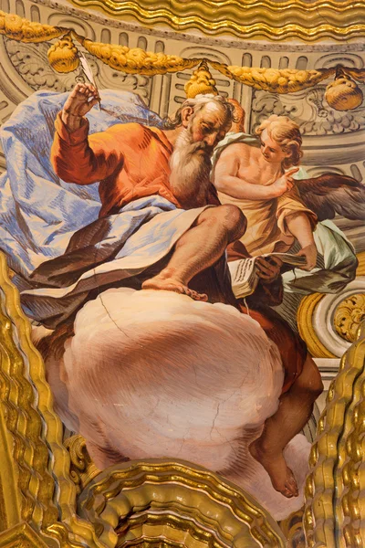 GRANADA, SPAIN - MAY 31, 2015: The fresco of St. Matthew the evangelist in baroque sanctuary (Sancta Sanctorum) in church Monasterio de la Cartuja by Antonio Palomino (early of 18. cent.) — Stock Fotó
