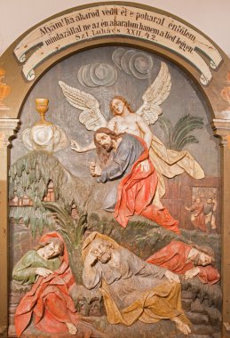 BANSKA STIAVNICA, SLOVAKIA - FEBRUARY 5, 2015: The carved relief of Jesus prayer in Gethsemane garden as the part of baroque Calvary from years 1744 - 1751.