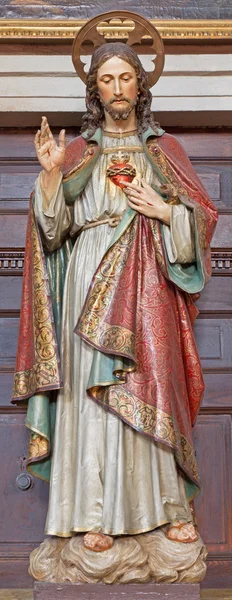 BANSKA STIAVNICA, SLOVAKIA - FEBRUARY 5, 2015: The carved and polychrome statue of heart of Jesus Christ in parish church by unknown artist of 19. cent. — 图库照片