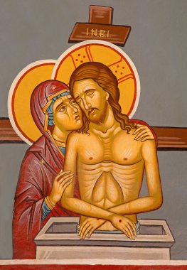 JERUSALEM, ISRAEL - MARCH 5, 2015: The death Christ with the holy Mary icon at the entry to orthodox chapel on the Via Dolorosa by unknown artist.