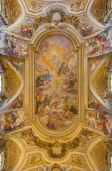 ROME, ITALY - MARCH 25, 2015: The ceiling fresco (Triumph of Franciscans order - Trionfo dell'Ordine) by Francescano del Baciccio (1707) in church Basilica dei Santi XII Apostoli .
