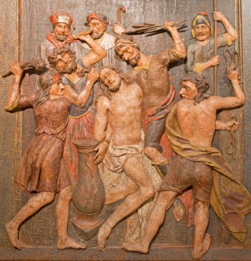 BANSKA STIAVNICA, SLOVAKIA - FEBRUARY 5, 2015: The carved relief of Flagellation as the part of baroque Calvary from years 1744 - 1751. clipart