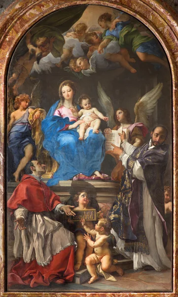 Rom, italien - 26. märz 2015: madonna thront mit ss charles borromeo und ignatius von carlo maratta 1680 in der kirche chiesa nuova (santa maria in vallicella). — Stockfoto