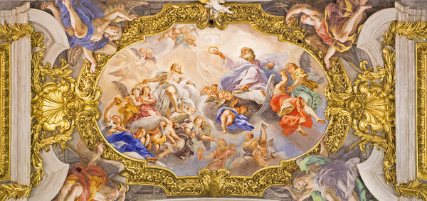 ROME, ITALY - MARCH 25, 2015:  The detail of fresco on ceiling of church Chiesa del Jesu "The Triumph of Name of Jesus" by  by Giovani Battista Gaulli (nickname Baciccio 1639 - 1709).