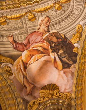 GRANADA, SPAIN - MAY 31, 2015: The fresco of St. Luke the Evangelist in baroque sanctuary (Sancta Sanctorum) in church Monasterio de la Cartuja by Antonio Palomino (early of 18. cent.)