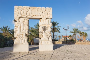 ROME, ITALY - MARCH 26, 2015: The fresco of angels wiht the music instruments in Thomas of Villanova side chapel by unknown TEL AVIV, ISRAEL - MARCH 2, 2015: The modern contemporary sculof 19, cent. in church in Basilica di Sant Agostino (Augustine).