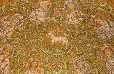 JERUSALEM, ISRAEL - MARCH 3, 2015: The mosaic of The Lamb of God among the saints in side apse of Dormition abbey by Benedictine Radbod Commandeur from the Benedictine Abbey of Maria Laach - 20. cent.