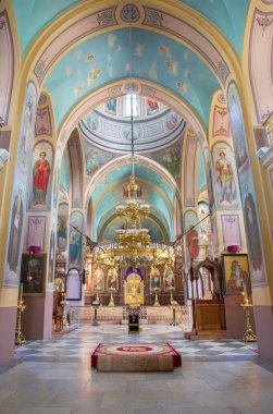 JERUSALEM, ISRAEL - MARCH 5 , 2015: The nave of Russian orthodox cathedral of Holy Trinity in the Russian Compound by architect Martin Eppinger. The church was consecrated in 1872.