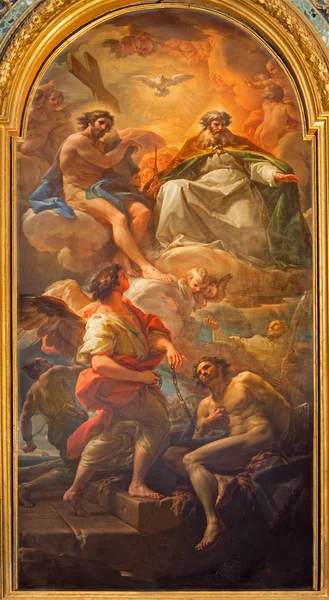 ROMA, ITALIA - 25 DE MARZO DE 2015: La Pintura de la Santísima Trinidad y la liberación del único esclavo por Corrado Giaquinto de la Iglesia Chiesa della Santissima Trinita degli Spanoli - Orden trinitario . — Foto de Stock