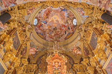 GRANADA, SPAIN - MAY 31, 2015: The baroque sanctuary (Sancta Sanctorum) in church Monasterio de la Cartuja with the fresco of St. Bruno and the glory of Eucharist by Palomino (early of 18. cent.)