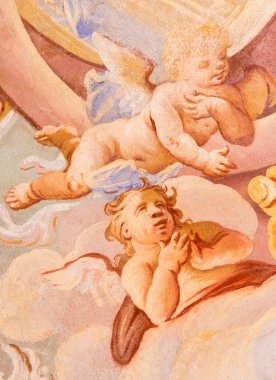 BANSKA STIAVNICA, SLOVAKIA - FEBRUARY 20, 2015: The detail of angels in fresco on cupola in the middle church of baroque calvary by Anton Schmidt from years 1745.