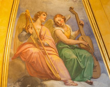 ROME, ITALY - MARCH 26, 2015: The fresco of angels wiht the music instruments in Thomas of Villanova side chapel by unknown artist of 19, cnet. in church in Basilica di Sant Agostino (Augustine).