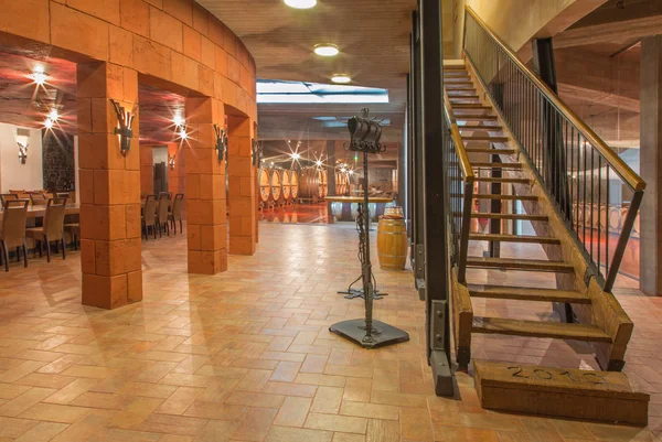 TRNAVA, SLOVAKIA - MARCH 3, 2014: Indoor of wine manufacture of great Slovak producer "Mrva and Stanko". Modern wine-tasting room. — Stock Photo, Image