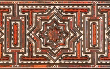 GRANADA, SPAIN - MAY 31, 2015: Detail of decoration of baroque furniture in sacristy of church  Monasterio de la Cartuja by carthusian  J. Manuel Vazquez from 18. cent.