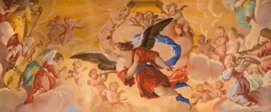 GRANADA, SPAIN - MAY 31, 2015: The detail of angles fresco in baroque sanctuary (Sancta Sanctorum) in church Monasterio de la Cartuja by Palomino (early of 18. cent.)