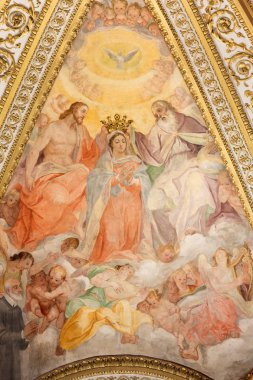 ROME, ITALY - MARCH 25, 2015: The fresco in side apse of church Chiesa San Marcello al Corso by Francesco Salviati (1563). The Coronation, Dormition and Assumption of Virgin Mary.