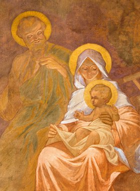 BANSKA BELA, SLOVAKIA - FEBRUARY 5, 2015: The fresco of Holy Family in St. John the Evangelist church by Jan Antal (1905) as the detail of Adoration of sheepherds scene.