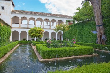 GRANADA, SPAIN - MAY 30, 2015: The gardens and Generalife palace in morning.