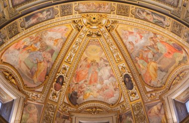 ROME, ITALY - MARCH 25, 2015: The fresco in side apse of church Chiesa San Marcello al Corso by Francesco Salviati (1563). The Coronation, Dormition and Assumption of Virgin Mary.