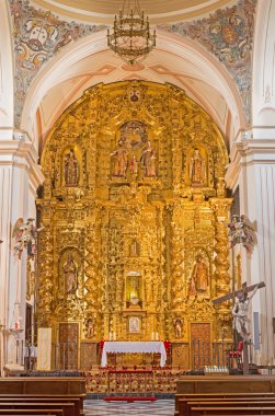 CORDOBA, SPAIN - MAY 26, 2015: The carved main altar in church of Monastery of st. Ann and st.Joseph (Convento de Santa Ana y San Jose) by Sanchez de Rueda (1710).