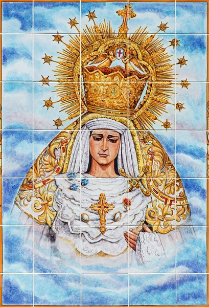 CORDOBA, SPAIN - MAY 26, 2015: The ceramic tiled, cried Madonna on the facade of church Iglesia de Nuestra Senora de Gracia by Catalina Alaide from 20. cent. — 图库照片