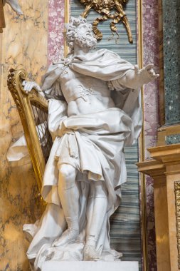 ROME, ITALY - MARCH 25, 2015: The statue of The King David by Andre Jean Lebrun (1769) from side chapel of Immaculate Comception in baroque church Basilica dei Santi Ambrogio e Carlo al Corso.