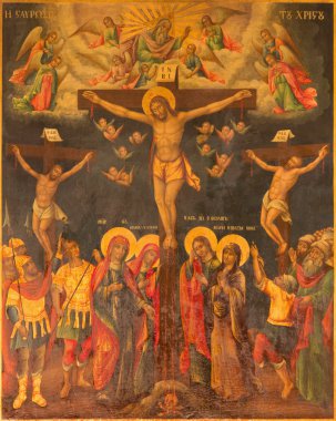 JERUSALEM, ISRAEL - MARCH 3, 2015: The icon of Crucifixion in Church of Holy Sepulchre by unknown artist.
