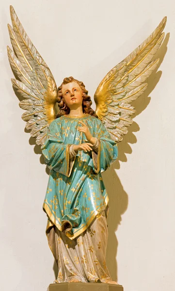 BANSKA STIAVNICA, SLOVAKIA - FEBRUARY 5, 2015: The carved polychrome statue of angel in st. Elizabeth church from 19. cent. probably by carver Jozef Kraus. — 图库照片