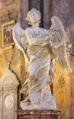 ROME, ITALY - MARCH 25, 2015: The marble statue of Angel with the crown of thorns (copy on the Angels bridge) in church Basilica di Sant' Andrea delle Fratte by Gian Lorenzo Bernini (1598 - 1680).