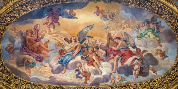 ROMA, ITALIA - 25 DE MARZO DE 2015: La pintura simbólica La gloria de los ángeles de Luigi Garzi (17. céntimo.) en ambulatorio de la iglesia barroca Basílica dei Santi Ambrogio e Carlo al Corso . — Foto de Stock