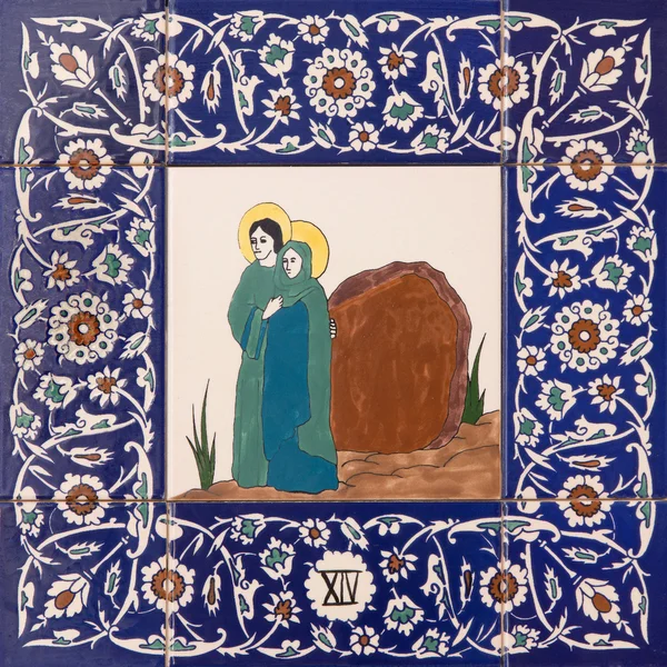 JERUSALEM, ISRAEL - MARCH 5, 2015: The ceramic tiled station of Cross way in st. George anglicans church from 20. cent. by unknown artist. St. John and mother Mary for the tomb. — 스톡 사진