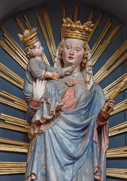 NEUBERG AN DER MURZ, AUSTRIA - SEPTEMBER 13, 2015: The carved polychrome gothic statue of "Neuberger Madonna"  from year 1344 in Dom of Neuberg. — Stock Photo, Image