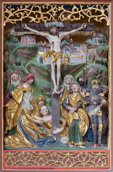 NEUBERG AN DER MURZ, AUSTRIA - SEPTEMBER 13, 2015: The polychrome carved Crucifixion on side altar of gothic Dom by unknown artist from year 1505. — Zdjęcie stockowe