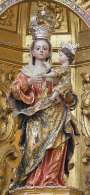 CORDOBA, SPAIN - MAY 26, 2015: The carved polychrome statue of Madonna from 17. cent. in church of monastery Convento Santa Marta.