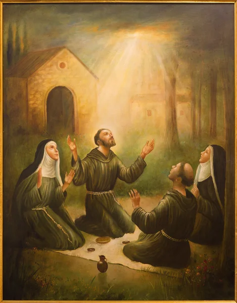 CORDOBA, SPAIN - MAY 27, 2015: The St. Francis of Assisi and St. Clara at prayer in front of Porziuncola in church Convento de Capuchinos (Iglesia Santo Angel). Paint from 20. cent. by unknown artist — Stock Photo, Image