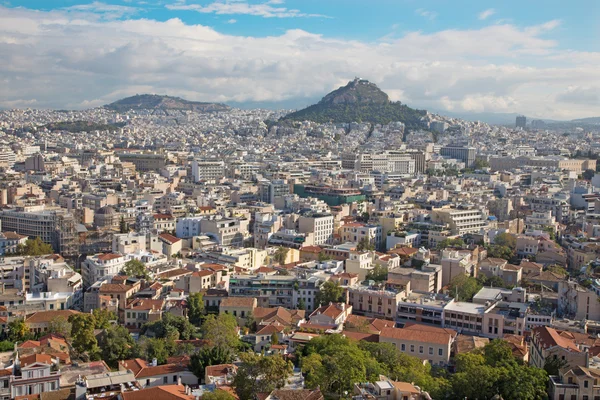 ATENAS, GRÉCIA - OUTUBRO 8, 2015: O olhar da Acrópole para a colina Likavittos e da cidade. — Fotografia de Stock