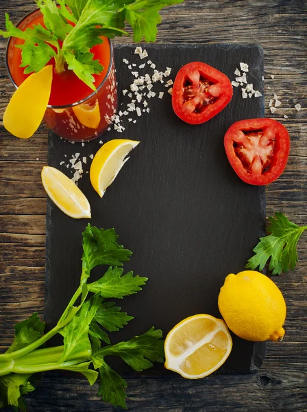 Bloody mary cocktail and ingredients for making a cocktails arranged — Stock Photo, Image