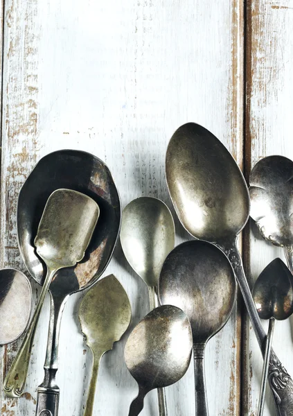 Vintage spoons on wooden background — Stock Photo, Image