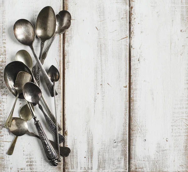 Vintage spoons on wooden background — Stock Photo, Image