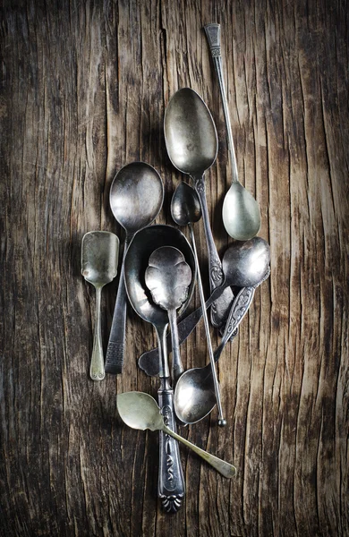 Vintage spoons on wooden background — Stock Photo, Image