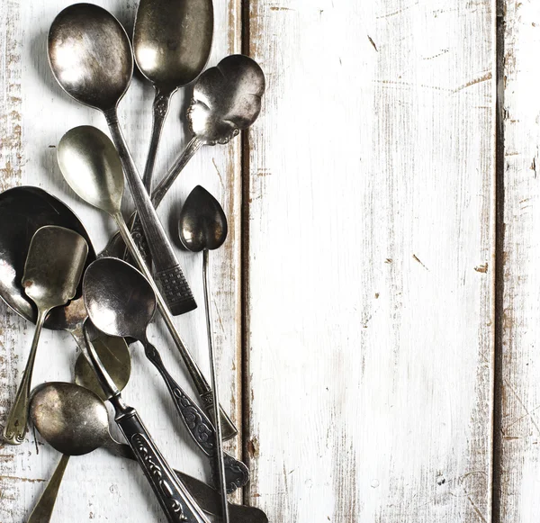 Vintage spoons on wooden background — Stock Photo, Image