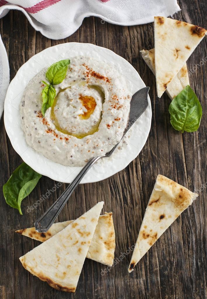 Eggplant dip baba ganoush with smoked paprika. Selective focus Stock