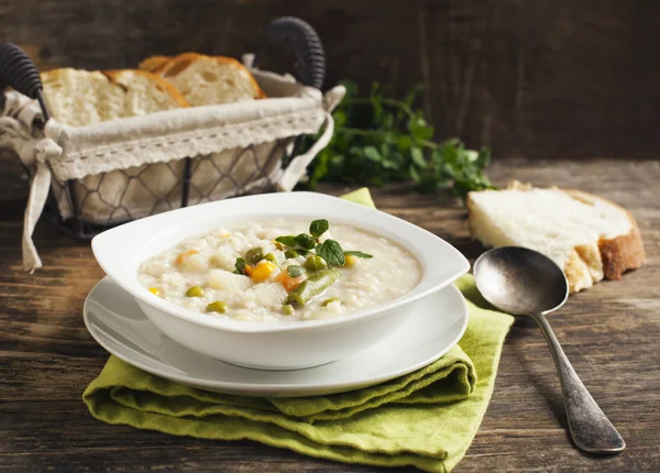 Chowder with rice and vegetables. Selective focus on the centre — Stock Photo, Image