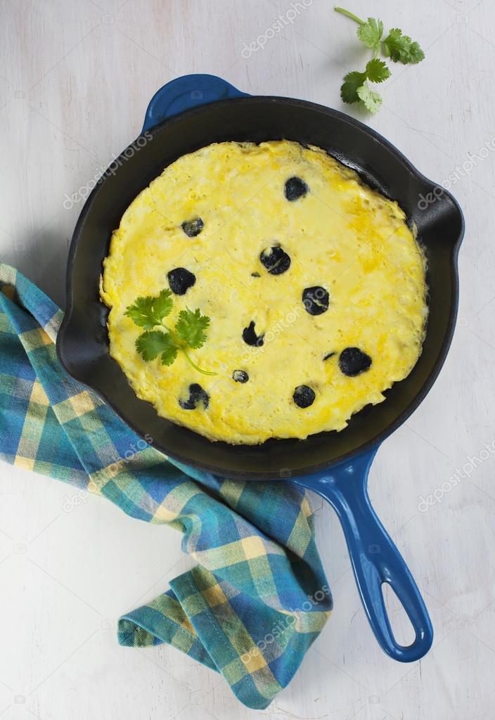 Omelette with black truffle and herbs Stock Photo by ©Anjela30 58393337