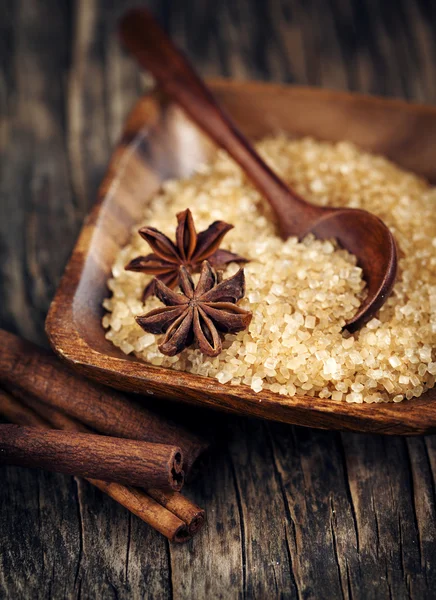 Baking ingredients Cinnamon sticks, star anise and brown sugar. — Stock Photo, Image