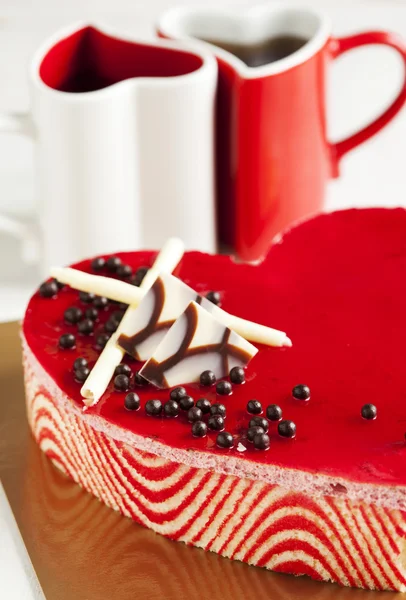 Strawberry mousse cake in the shape of a heart — Stock Photo, Image