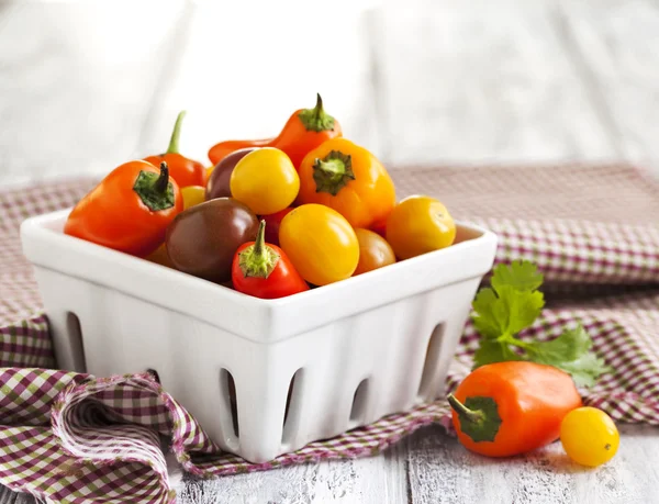 Mini sweet peppers and mini tomatoes — Stock Photo, Image