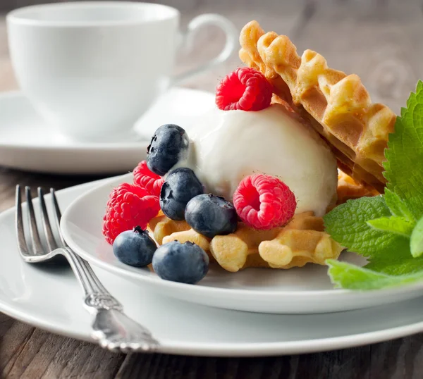 Waffle decorated with ice cream scoop and berries — Stock Photo, Image